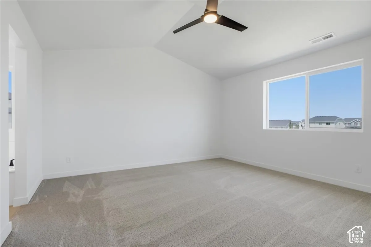 Spacious Vaulted Primary Bedroom