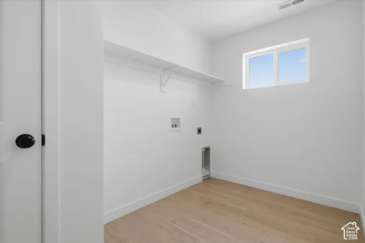 Large Laundry Room with Large Storage Closet.  Keep Laundry Room Clutter Free!