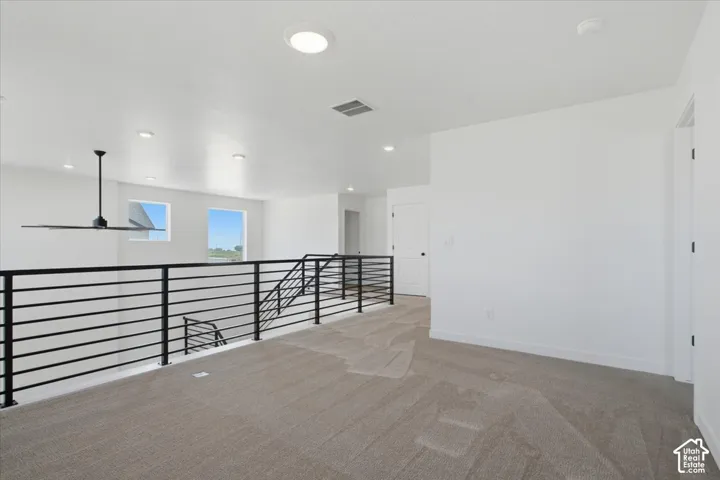 Spacious Loft.  Perfect Flex Room for an Additional Family Room, Game Room, or Library.