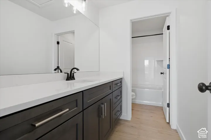 Large 2nd Bath Upstairs with a Vanity w/ Space to Spare!  Separate Shower/Tub Allows for ease of sharing the space