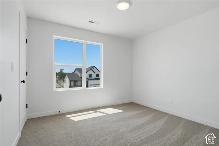 Bedroom #3 -The walk-In closet has window for  natural light