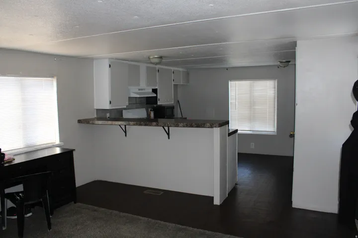 Built-in breakfast bar with a patterned countertop