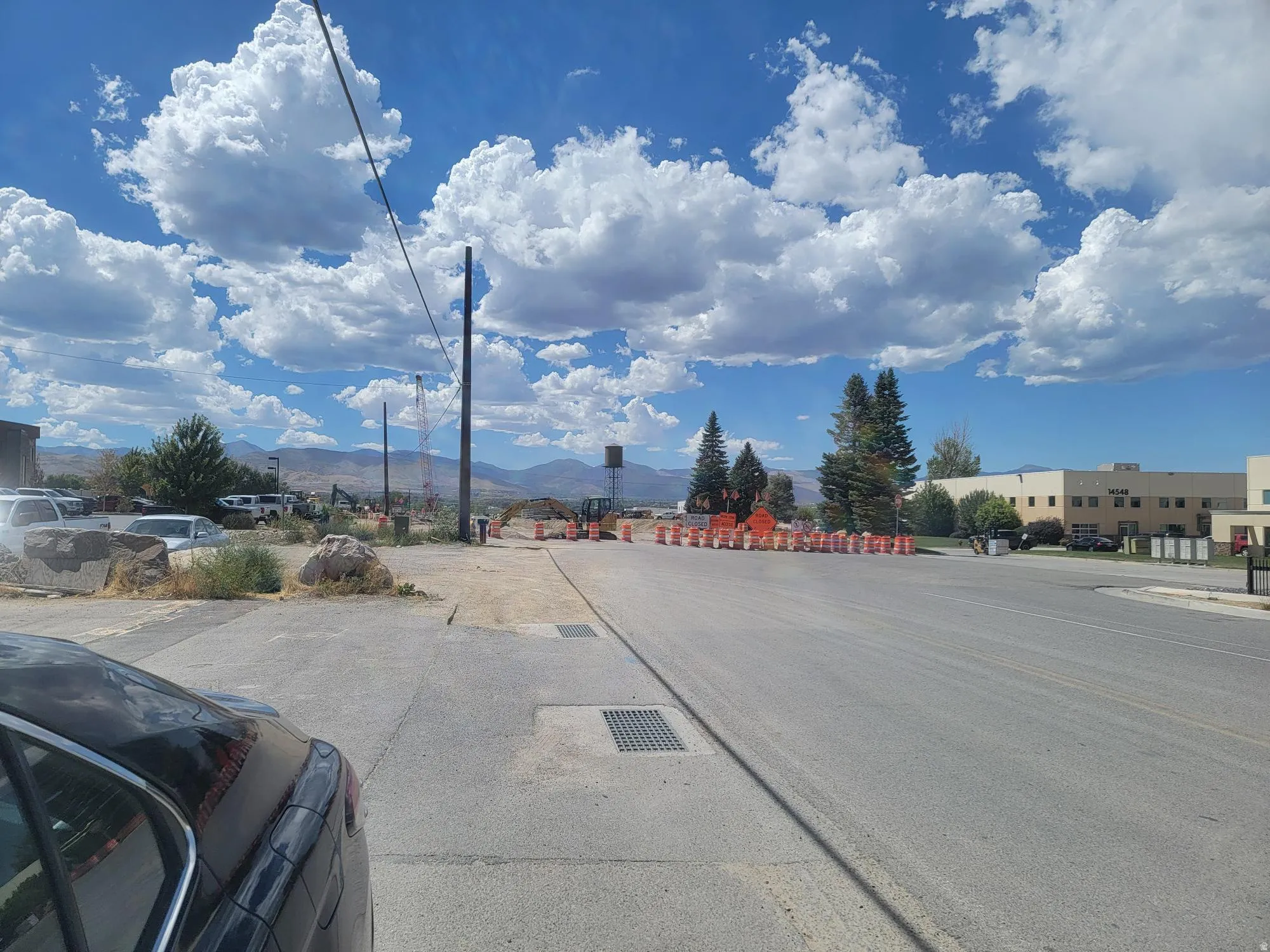 14600 South Will Be Great when finished, Turn Right at Cones (approx. 950 West) Then Quick Right again between the 2 beige buildings to 14441 So