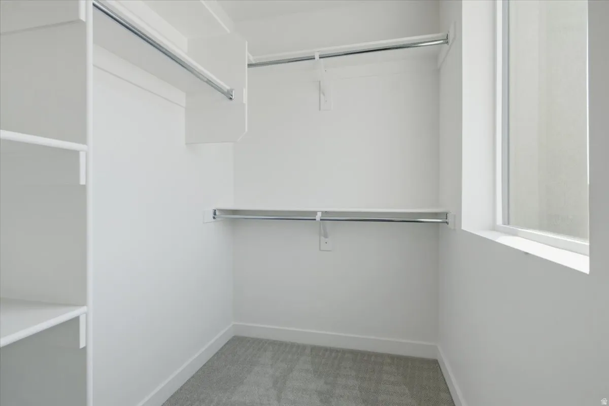 Walk in closet in secondary bedroom