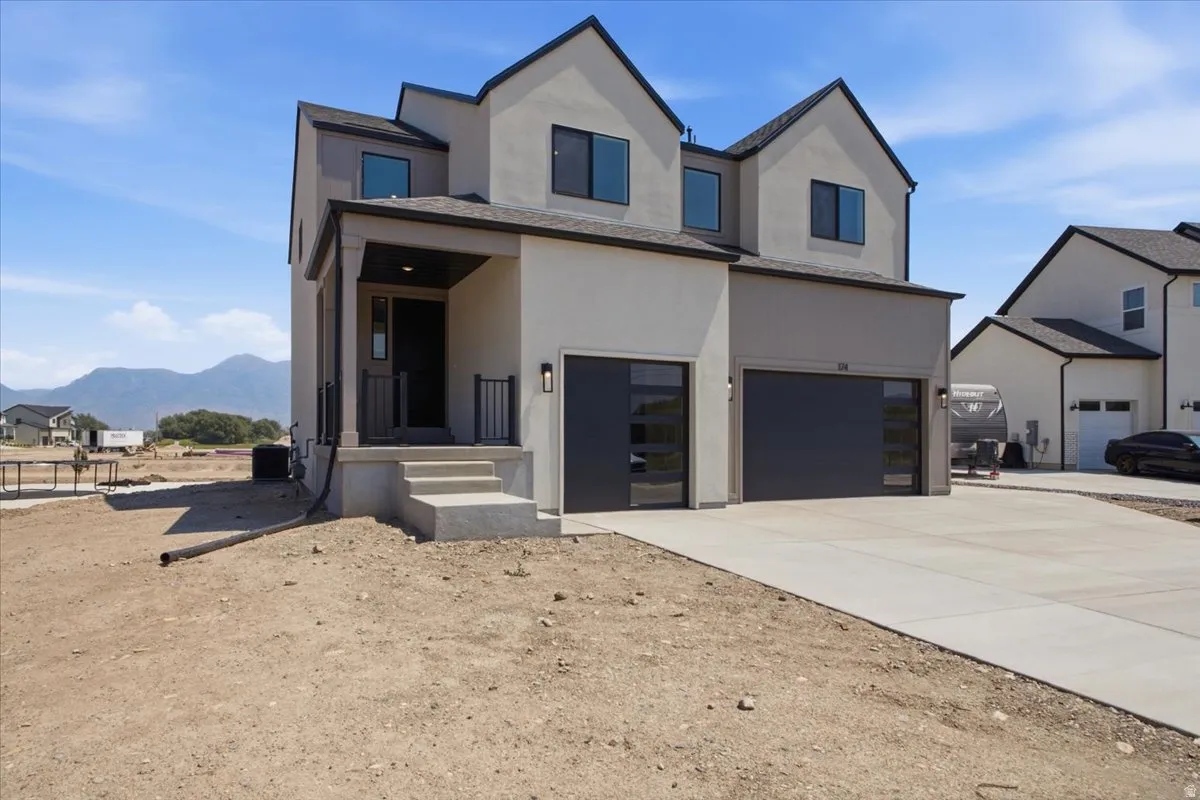 Upgraded Garage Doors with Stacked Windows