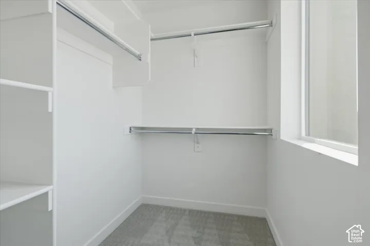 Walk in closet in secondary bedroom
