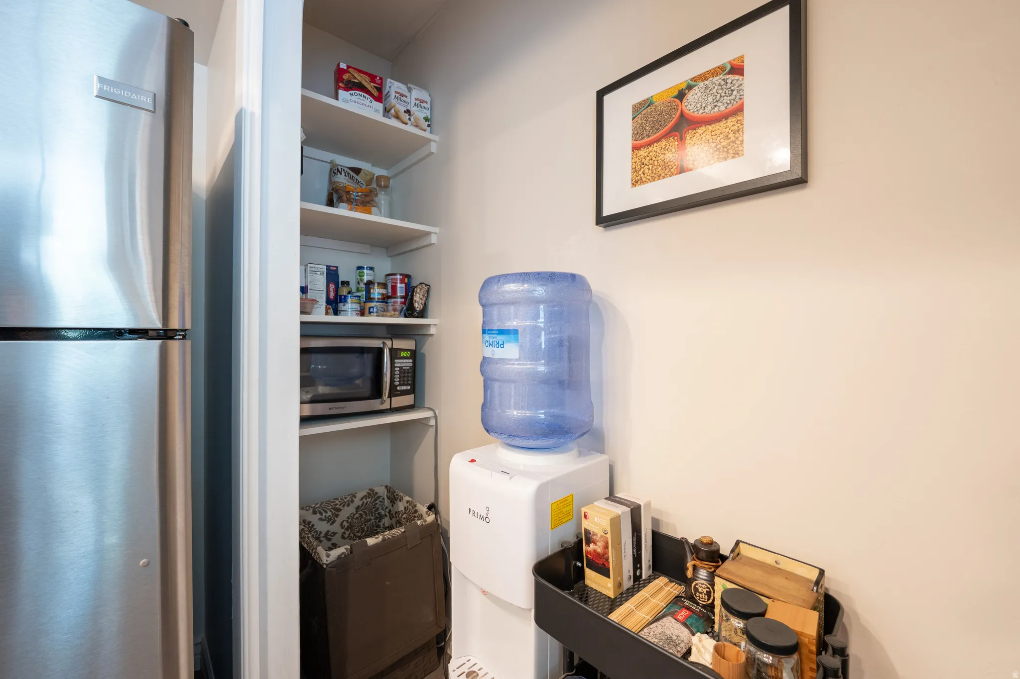 Stainless steel refrigerator and built-in shelving