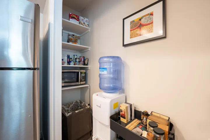 Stainless steel refrigerator and built-in shelving