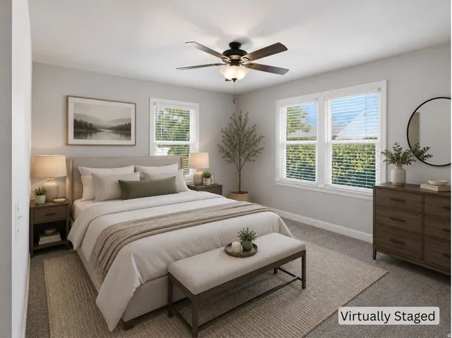 Two windows with white blinds