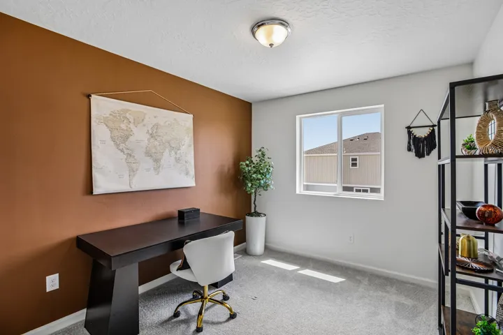 Recessed lighting, large window, and carpeted flooring