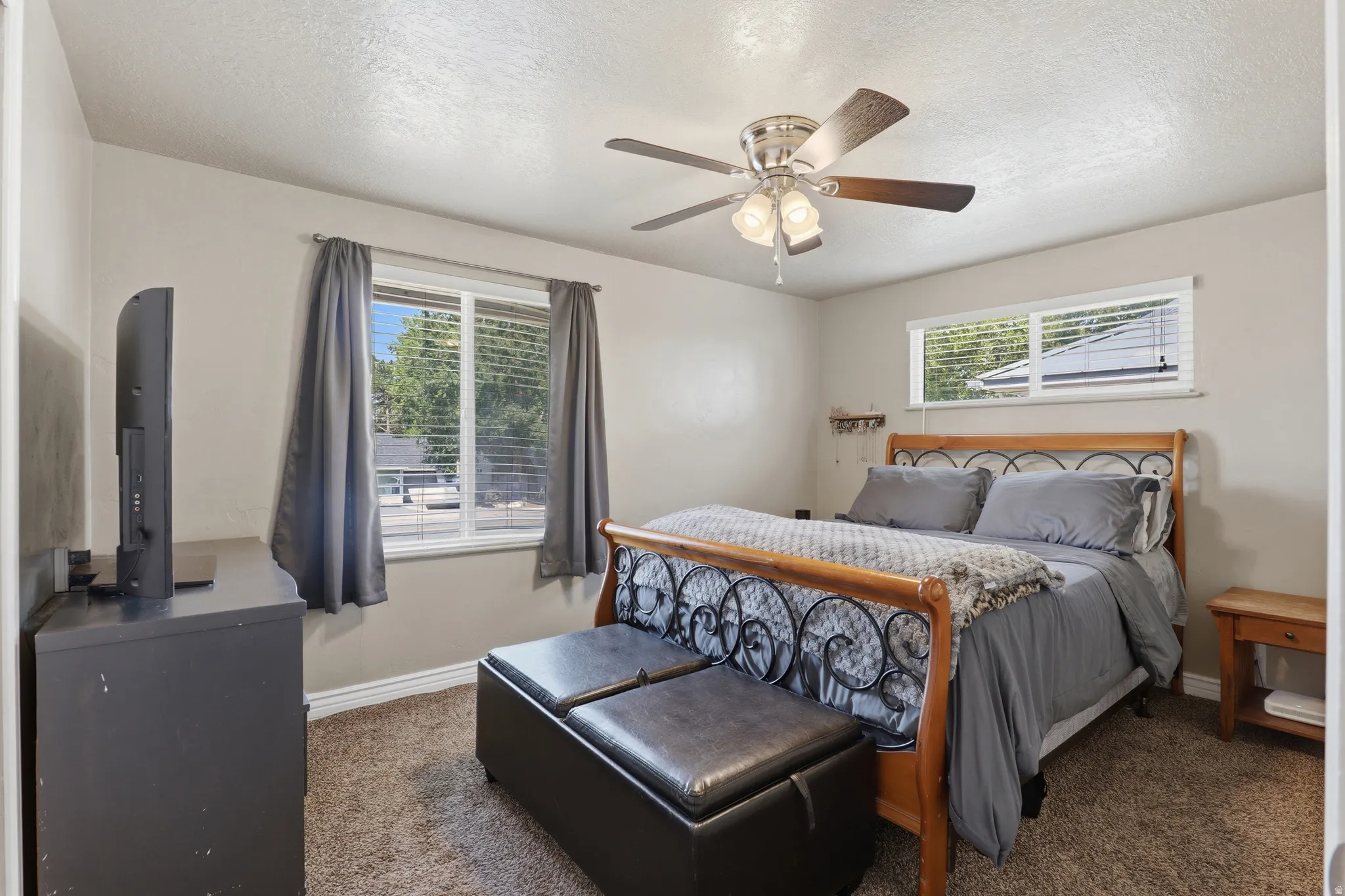Textured carpeting and neutral wall tones