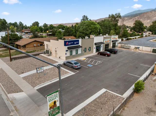 Paved parking lot with designated accessible spaces