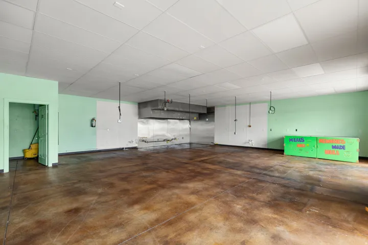 Expansive open space with concrete flooring