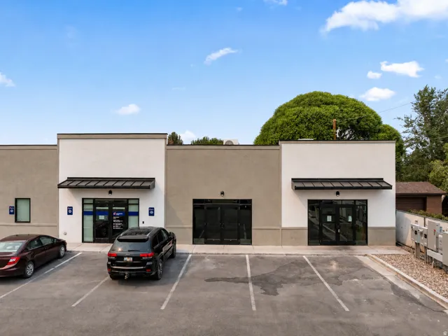 Two-tone stucco exterior with a flat roofline