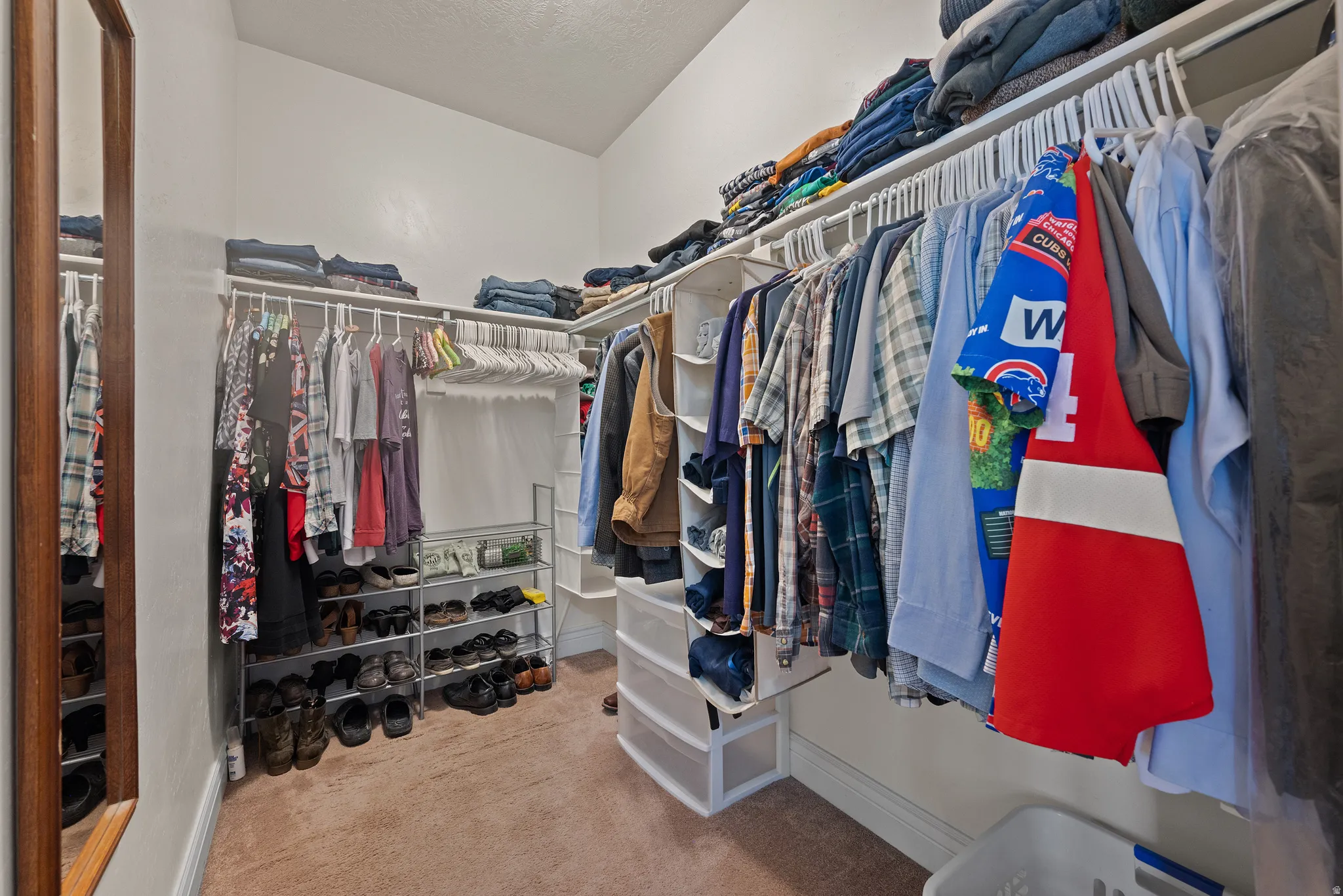 MASTER BEDROOM HAS A WALK-IN CLOSET & BUILT IN SHELVING!