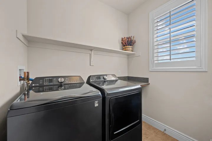MAIN FLOOR LAUNDRY! BONUS THE WASHER/DRYER STAY!