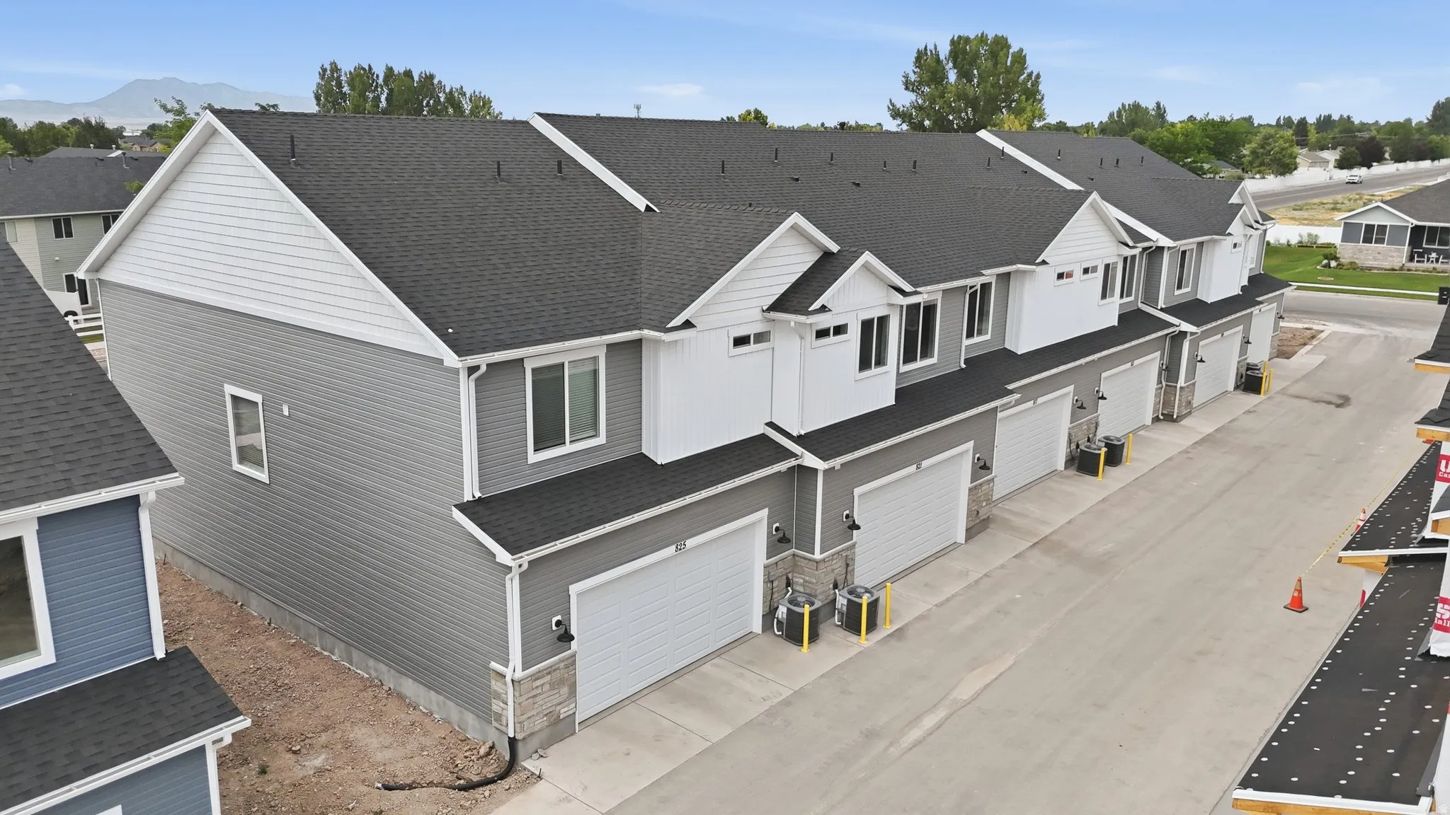 Gray siding exterior with white trim