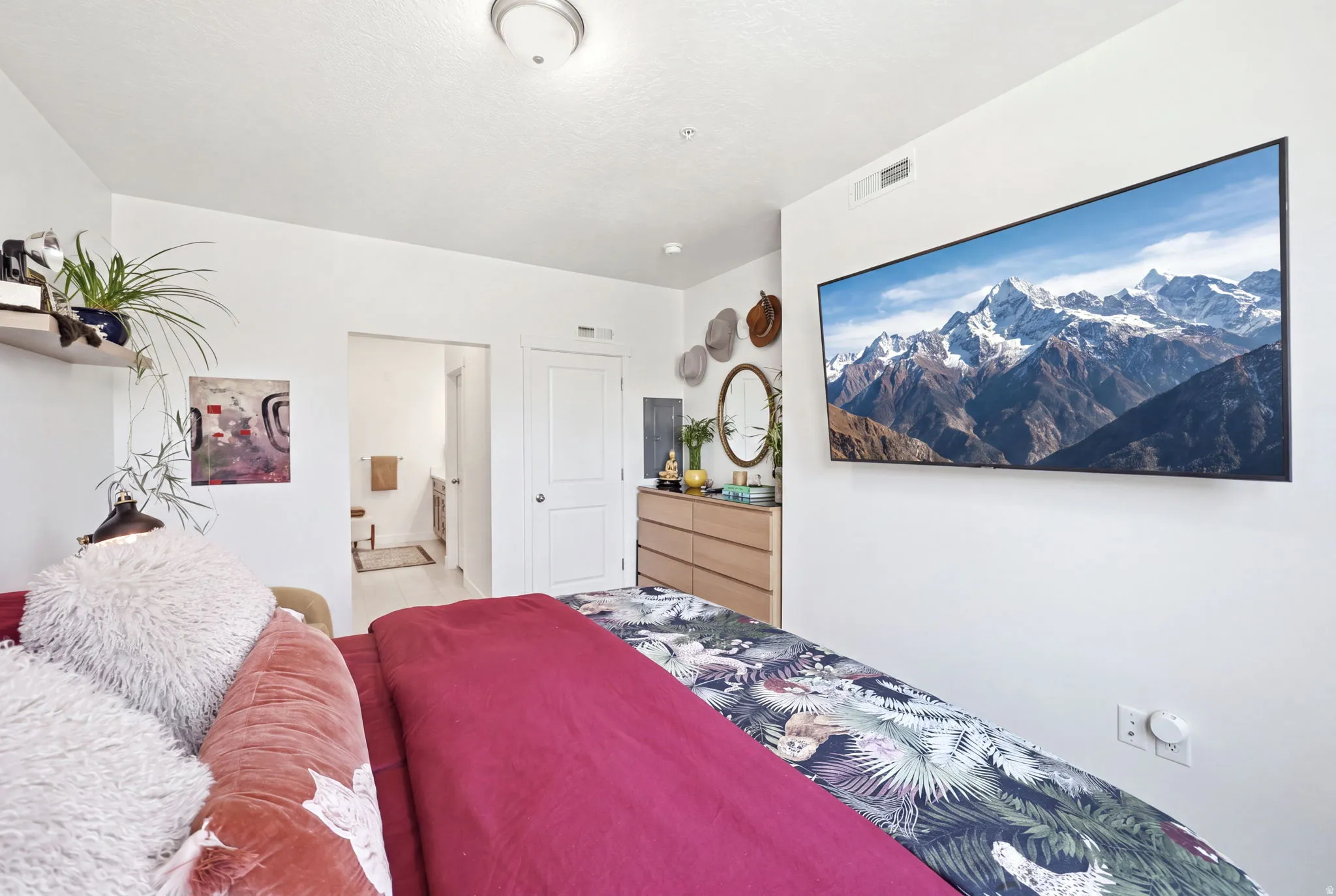 White walls with a ceiling-mounted light fixture