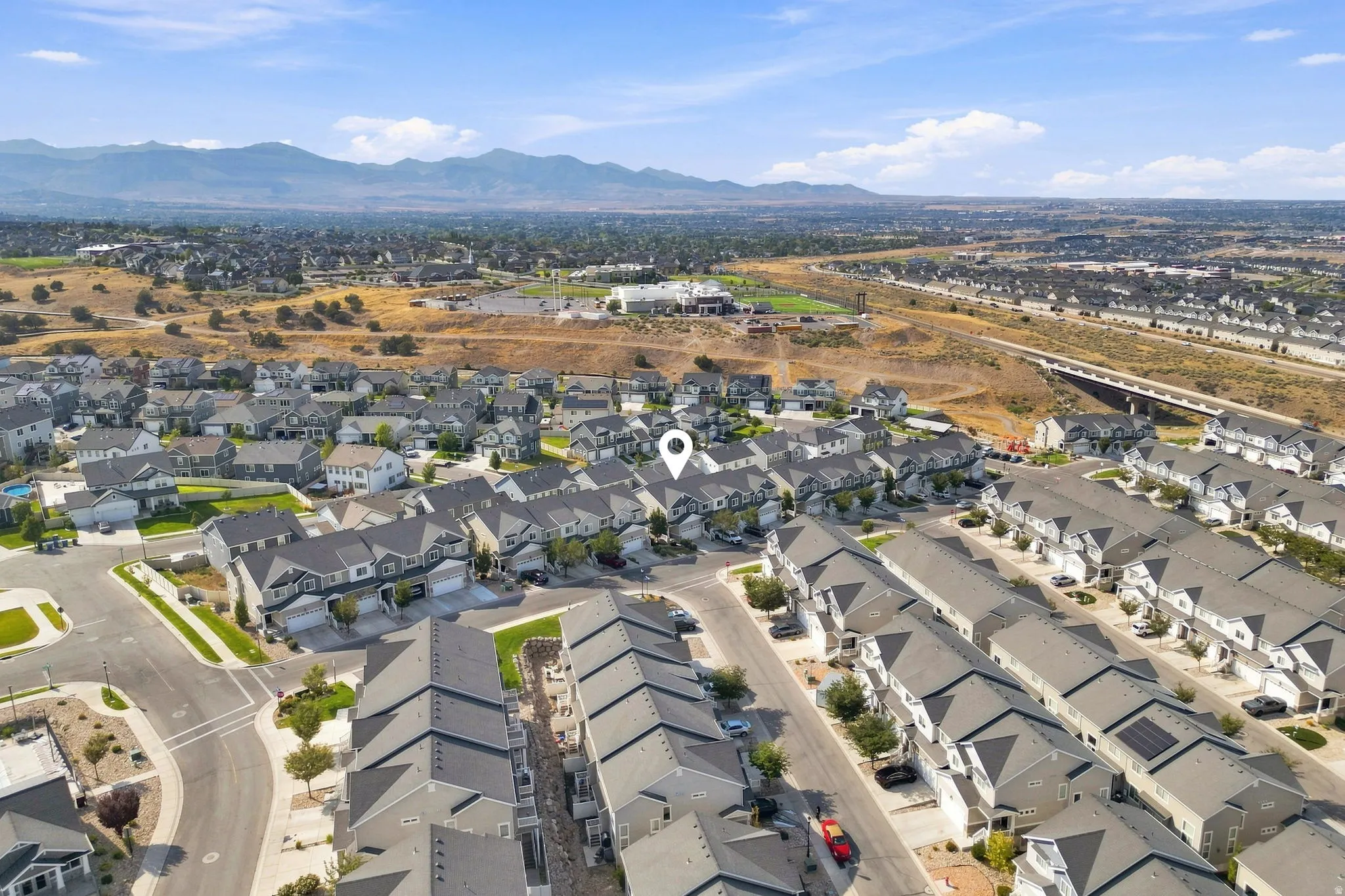 Residential neighborhood with a mountain backdrop
