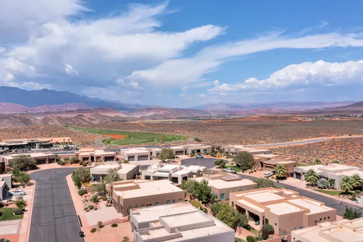 Expansive desert landscape with mountain backdrops
