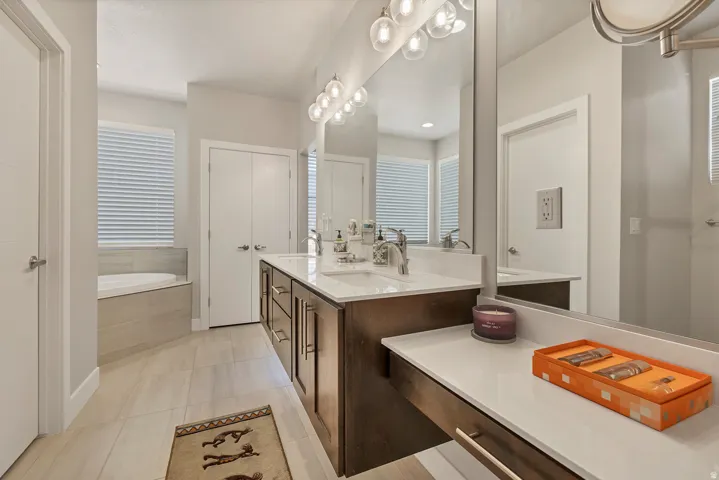 Dual vanity with undermount sinks and chrome fixtures