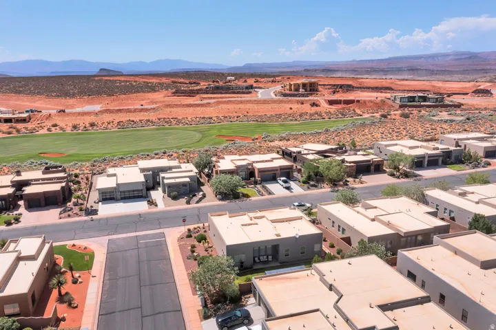 Modern residential architecture with flat roofs and desert landscaping