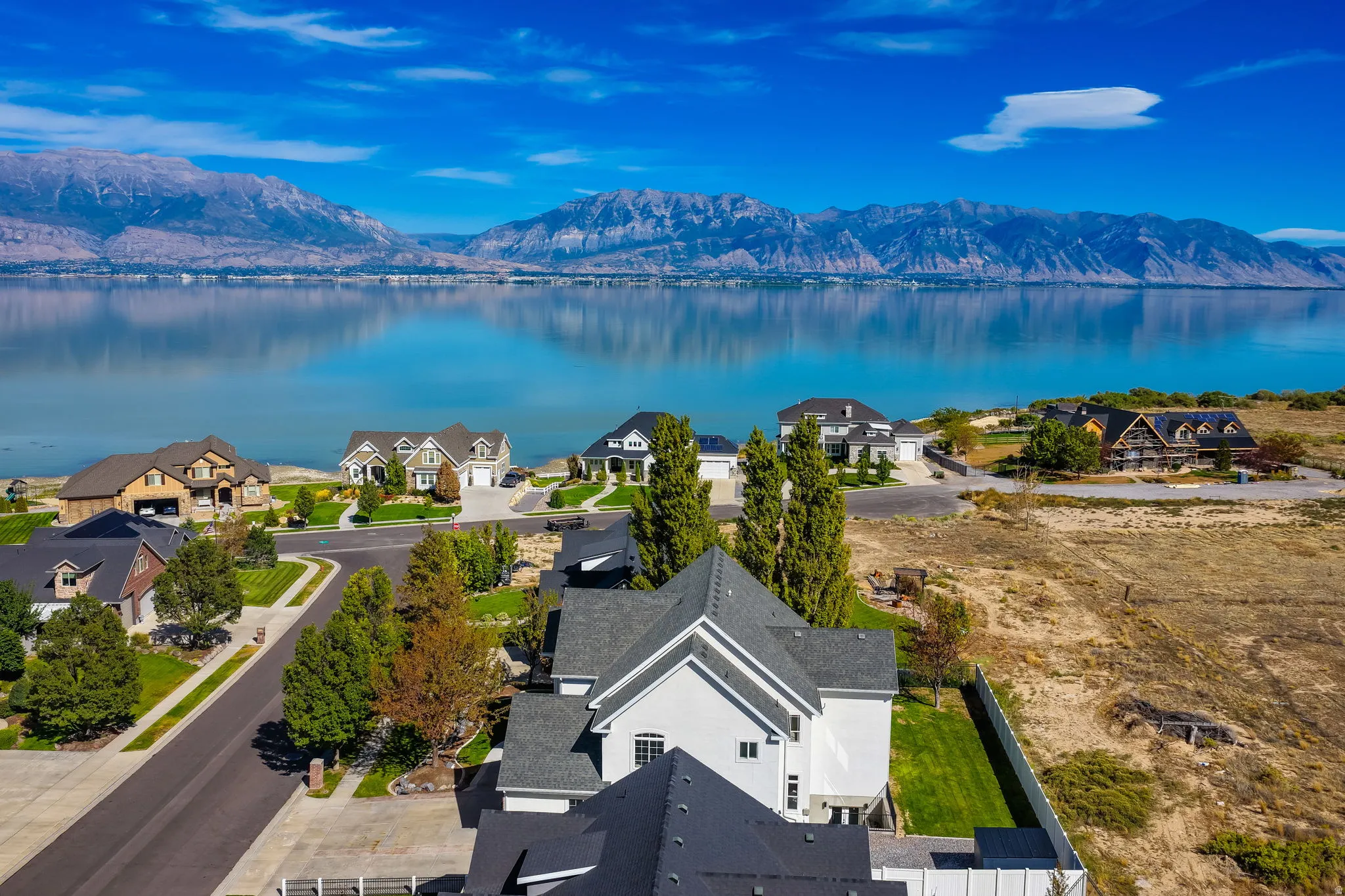 Mountain and lake scenery with residential properties