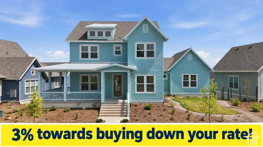 Two-story residence with light blue siding, a covered porch with white railing, and multiple windows