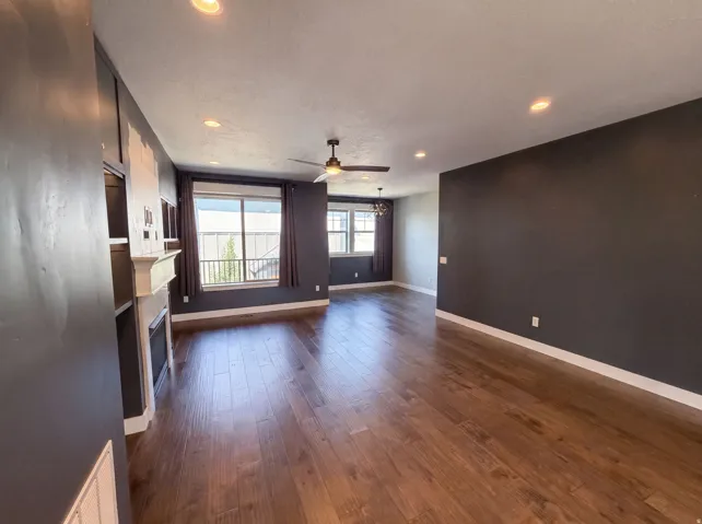 Wood-finish flooring throughout the space