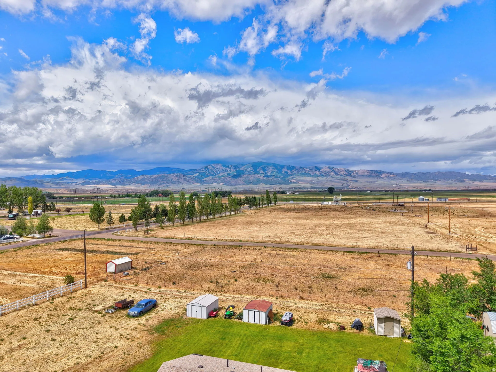 Expansive agricultural landscape with distant mountain ranges