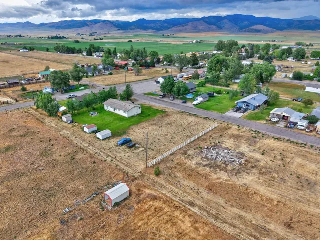 Expansive land parcel featuring open fields and distant mountains