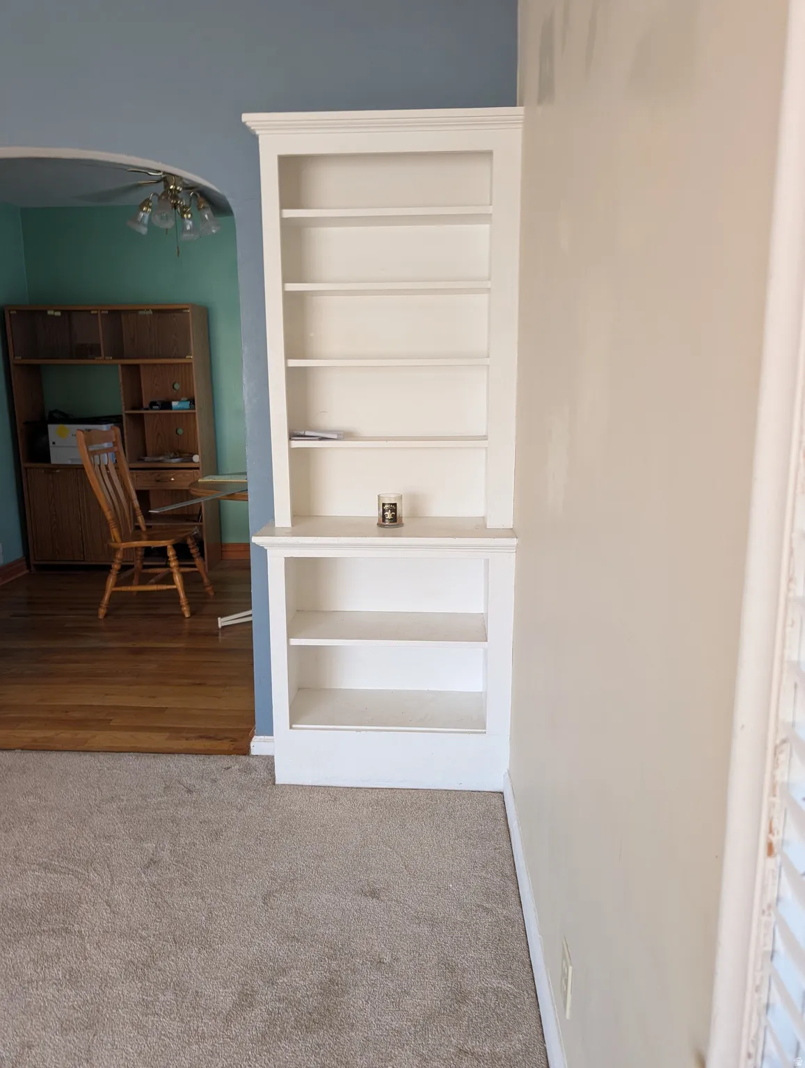 Built-in shelving unit with crown molding