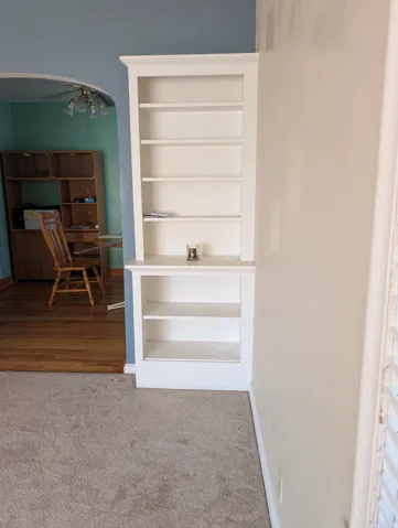 Built-in shelving unit with crown molding