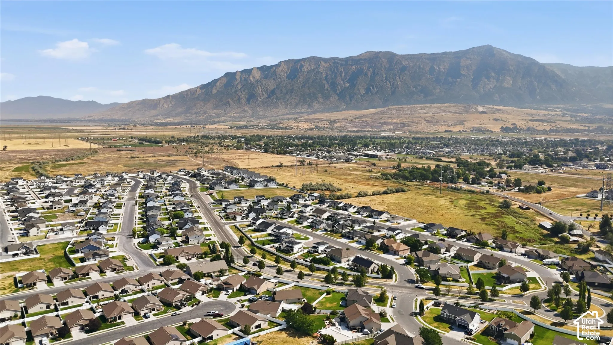 Mountain backdrop, suburban neighborhood, residential streets, developed landscape