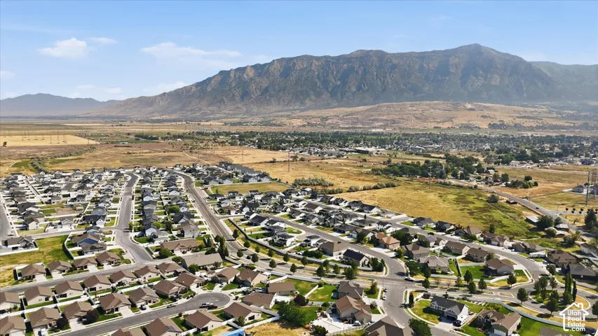 Mountain backdrop, suburban neighborhood, residential streets, developed landscape