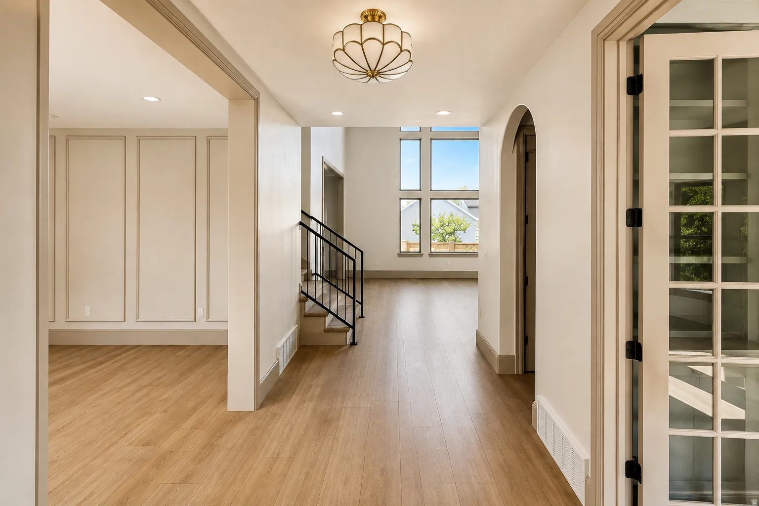 Beautiful entryway with views of the office and front room.