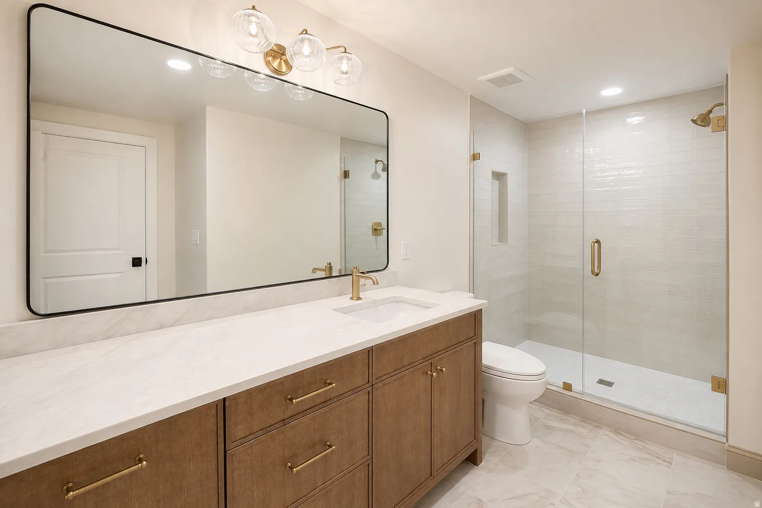 Basement apartment bath, with brand new vanity, tile flooring and plenty of storage.