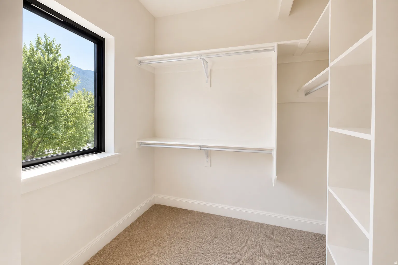 Bedroom 3's large walk-in closet with lovely natural lighting.
