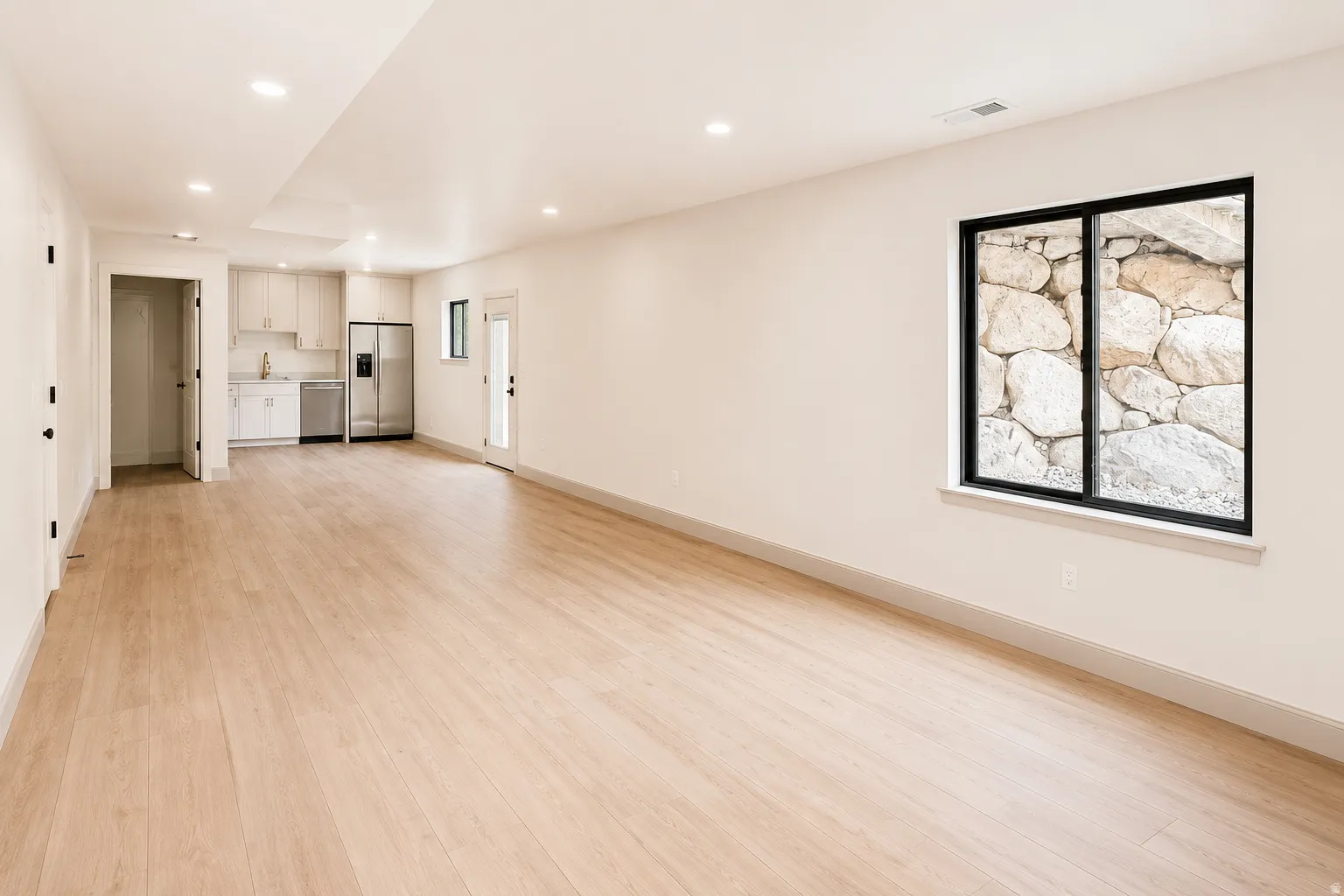Spacious room in a rentable basement apartment, with a separate walk-up access.