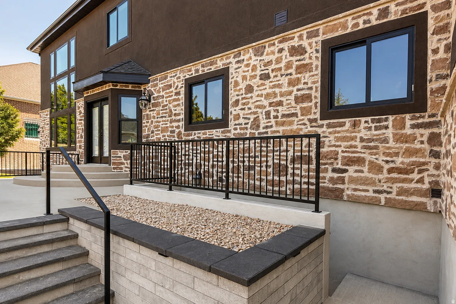 Large patio and walk down basement stairwell.