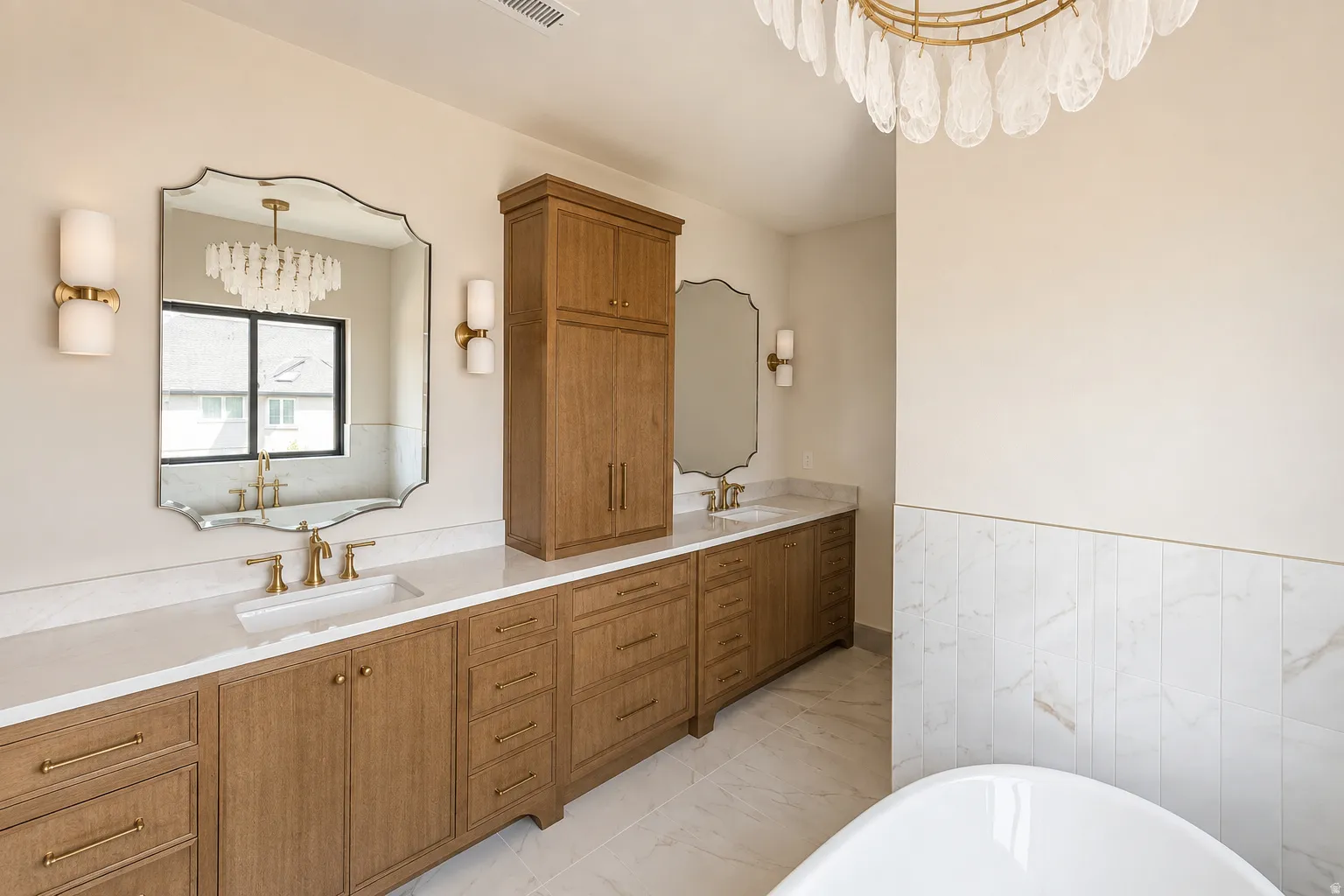 Primary double vanities with endless storage.