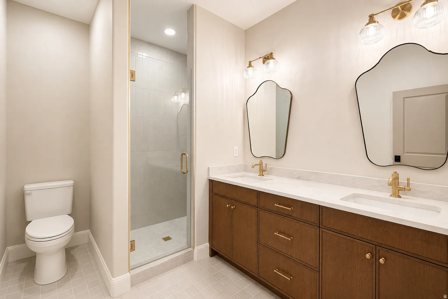 A brand new addition to this home is this shared bath with a wood double vanity and tile flooring.