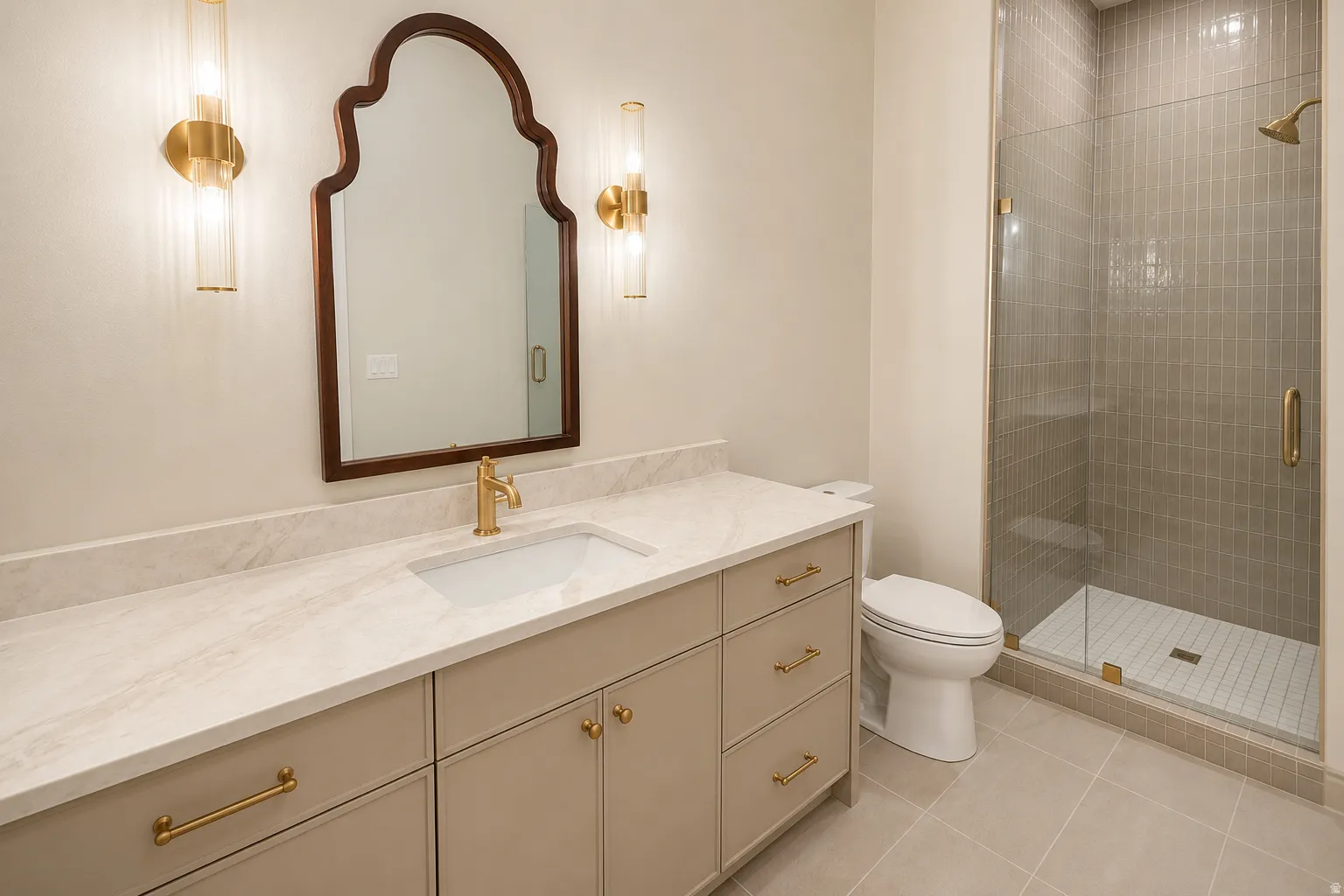 Bedroom 1's on suite full bath, with a brand new vanity, flooring and lighting.