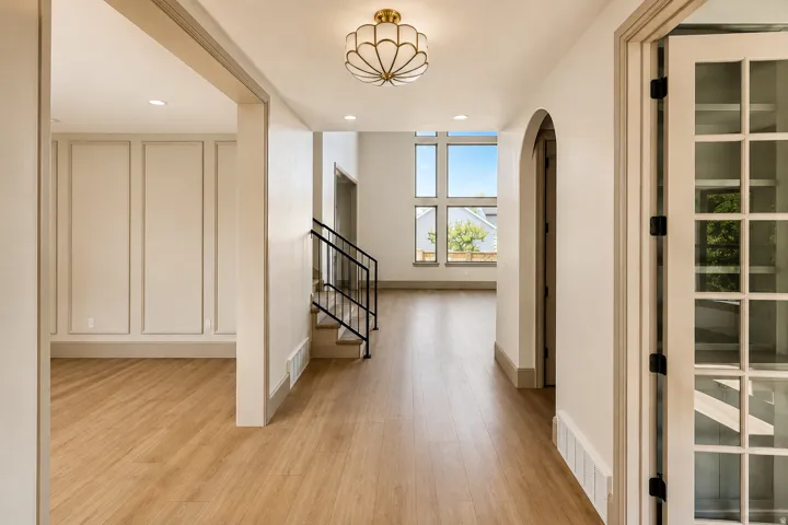 Beautiful entryway with views of the office and front room.