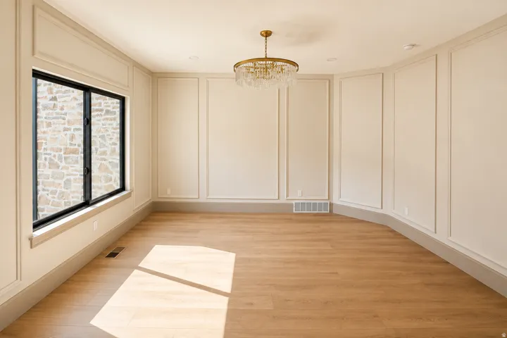 A classy dining space or sitting room, with new beautiful frame wall moldings.