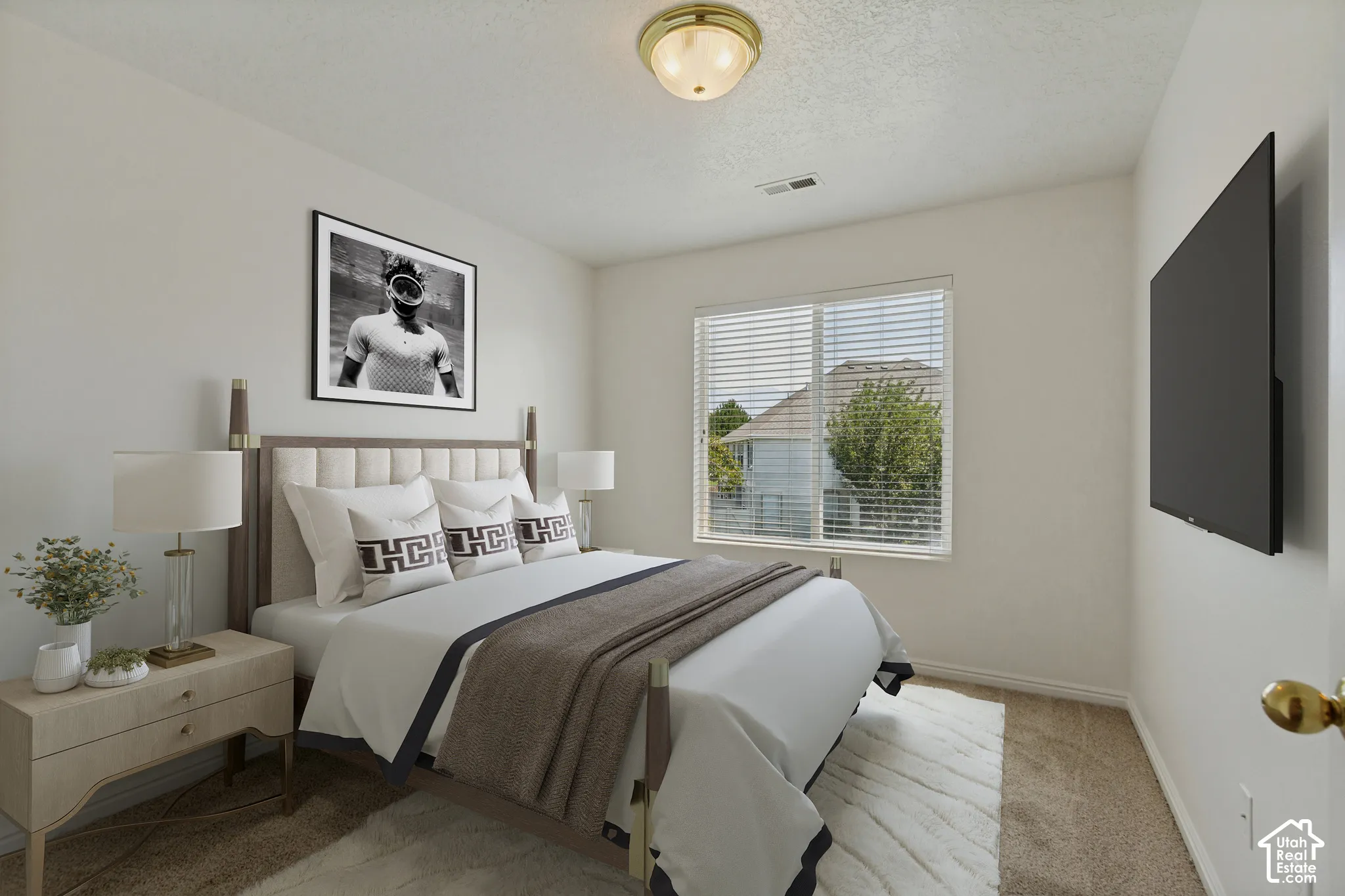 Neutral wall color, wall-to-wall carpeting, overhead flush mount light fixture, window with blinds, and white trim