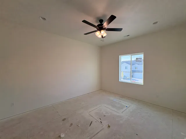 Ceiling fan with light fixture, recessed lighting, and a single window