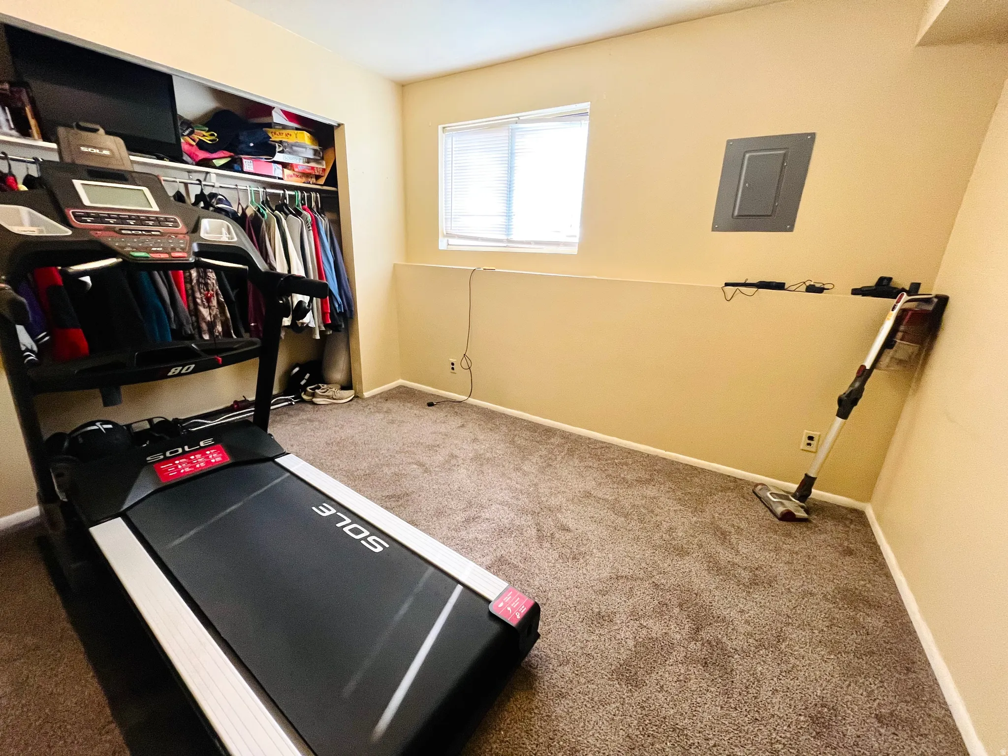 Spacious bedroom ready to fit a variety of needs.