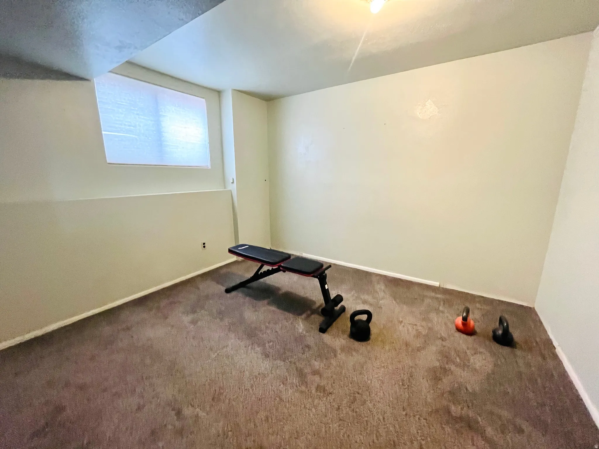 Versatile bedroom ideal for guests, an office, or additional living space.