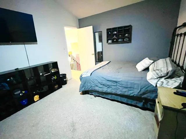 Spacious secondary bedroom with a welcoming feel.